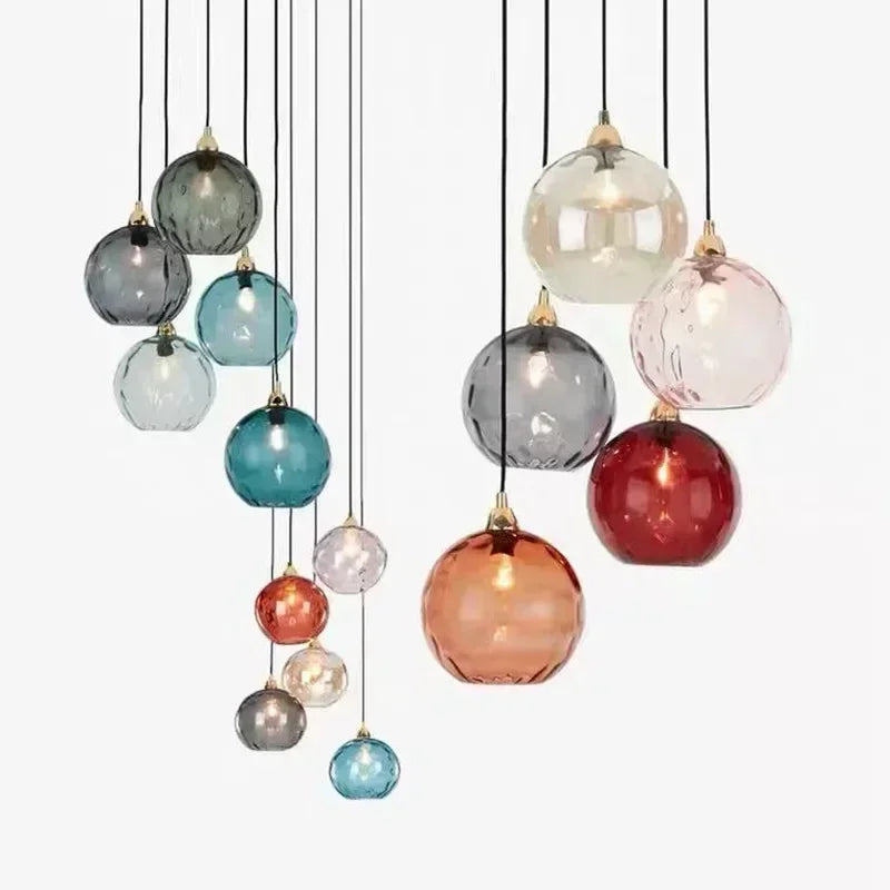 Suspension en boule de verre coloré orange