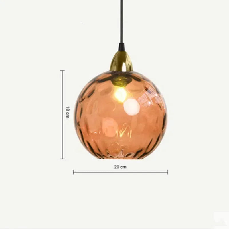 Suspension en boule de verre coloré orange